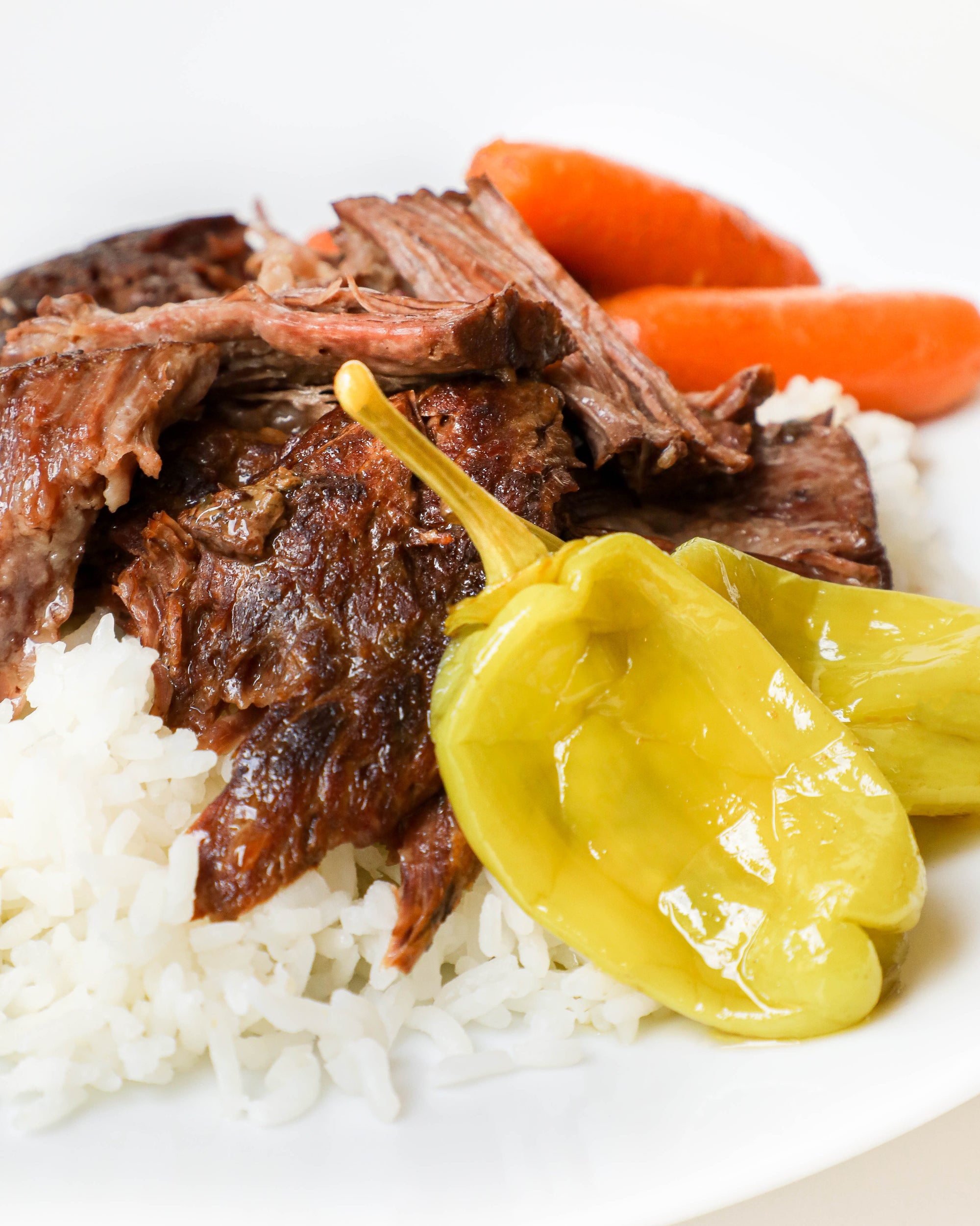 Brown Gravy Pot Roast recipe with carrots and peppers using the cajun spoon louisiana seasoning products